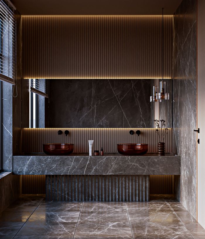 home-services-01 Elegant modern bathroom with marble design, double sink, and ambient warm lighting.